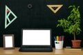 Education background. Back to school concept. Laptop with blank screen on the table. Royalty Free Stock Photo