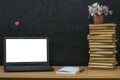 Education background. Back to school concept. Laptop with blank screen on the table. Royalty Free Stock Photo