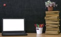 Education background. Back to school concept. Laptop with blank screen on the table. Royalty Free Stock Photo