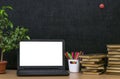 Education background. Back to school concept. Laptop with blank screen on the table. Royalty Free Stock Photo