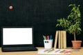 Education background. Back to school concept. Laptop with blank screen on the table. Royalty Free Stock Photo