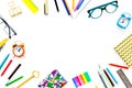 Education background, frame. School, student, office supplies. Stationery, glasses, alarm clock, notebook on white Royalty Free Stock Photo