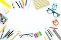 Education background, frame. School, student, office supplies. Stationery, glasses, alarm clock, notebook on white Royalty Free Stock Photo