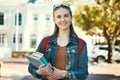 Education, campus and college portrait of student with books, backpack and ready for back to school learning Royalty Free Stock Photo