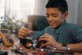 Education, car robot and smile of child with homework, homeschool and science, learning and tech project. Robotics