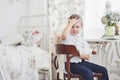 Education, childhood, people, homework and school concept - bored student boy reading book or textbook at home Royalty Free Stock Photo