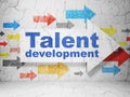Education concept: arrow with Talent Development on grunge wall background