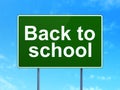 Education concept: Back to School on road sign background Royalty Free Stock Photo
