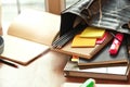 Education concept, Bag with book, notebook, pencil and pen marker with sticky note on table. Royalty Free Stock Photo