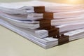 Stack of white paperwork achieves with black binder paper clips Royalty Free Stock Photo