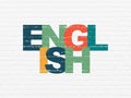 Education concept: English on wall background Royalty Free Stock Photo