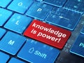 Education concept: Knowledge Is power! on computer keyboard back
