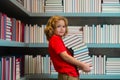 Education Concept. Little student on school library. Kid reading book at school. Nerd pupil. Clever intelligent Royalty Free Stock Photo