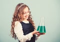 Education concept. School chemistry lesson. Chemical analysis. Harmful and vital options of chemical solute. Girl school Royalty Free Stock Photo