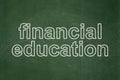 Education concept: Financial Education on chalkboard background Royalty Free Stock Photo