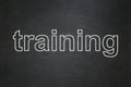 Education concept: Training on chalkboard Royalty Free Stock Photo