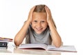 Young school student girl looking unhappy and tired in education concept Royalty Free Stock Photo