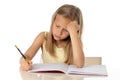 Young school student girl looking unhappy and tired in education concept Royalty Free Stock Photo