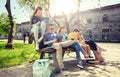 Group of students with tablet pc at school yard