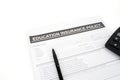 Education insurance policy document beneath a pen Royalty Free Stock Photo
