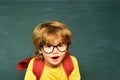 Education. Kids gets ready for school. Learning concept. First school day. Happy smiling pupils drawing at the desk Royalty Free Stock Photo