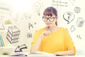 Smiling young asian woman reading book at home Royalty Free Stock Photo