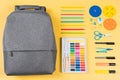 Education, learning, back to school background. Knolling composition with gray backpack and different school stationery