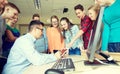 Group of students and teacher at school classroom