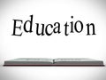 Education message above open book graphic Royalty Free Stock Photo