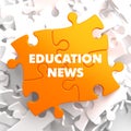 Education News on Orange Puzzle. Royalty Free Stock Photo