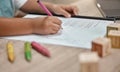 Education, paper and hands of child writing math homework, learning and study numbers for youth child development. Table Royalty Free Stock Photo