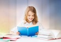 Happy smiling student girl reading book Royalty Free Stock Photo