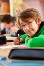 Education - Pupils at school doing homework Royalty Free Stock Photo