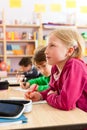 Education - Pupils at school doing homework Royalty Free Stock Photo