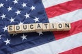 Education Reform in USA is shown using the text and American flag on the background Royalty Free Stock Photo