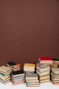 education science learning library stack of books on brown background