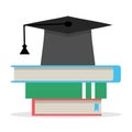 Education, stack of books and hat Royalty Free Stock Photo