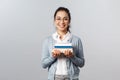 Education, teachers, university and schools concept. Smart and enthusiastic asian female student studying for exams Royalty Free Stock Photo