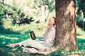 Education technology and internet concept. Girl work with laptop in park sit on grass. Natural environment office. Work Royalty Free Stock Photo