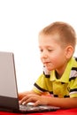 Education, technology internet - little boy with laptop Royalty Free Stock Photo