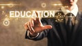 Education text with businessman Royalty Free Stock Photo