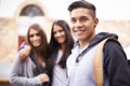 Education, university and portrait of man on campus ready for studying, education and learning together. Diversity Royalty Free Stock Photo