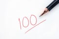 Educational concept, pen with written in red ink on white paper. full score test,red 100 full mark Royalty Free Stock Photo