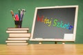 Educational concept - the school equipment and books relating to the chalkboard Royalty Free Stock Photo