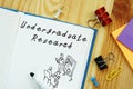 Educational concept about Undergraduate Research with sign on the page