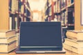 Educational e-learning class and e-book digital technology concept with pc computer notebook open in blur school library Royalty Free Stock Photo