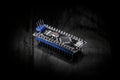 educational microcontroller Board arduino on black background Royalty Free Stock Photo