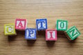 Educational toy cubes with letters organised to display word CAPTION - editing metadata and Search engine optimisation Royalty Free Stock Photo