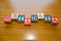 Educational toy cubes with letters organised to display word metadata - keywording and Search engine optimisation Royalty Free Stock Photo