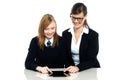 Educator and student exploring a tablet device Royalty Free Stock Photo